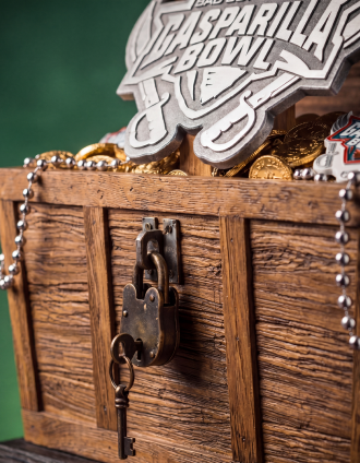 Gasparilla Bowl trophy chest filled with coins and beads